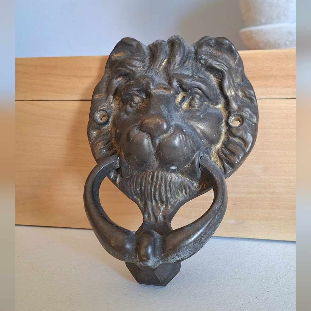 Lion head door knocker
